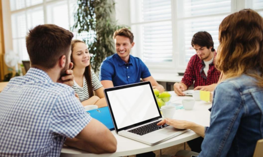 Team meeting discussing motivation and financial performance